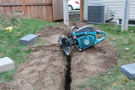 how to dig a trench with a mini digger|small held handheld trenchers.